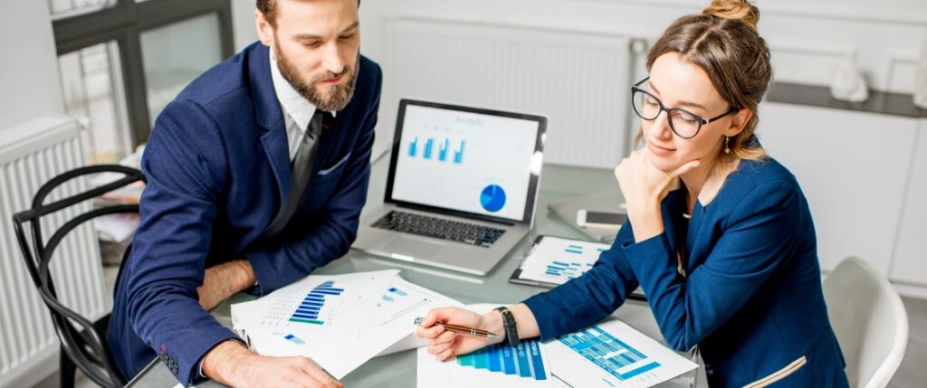 Marketing team reviewing data and analytics